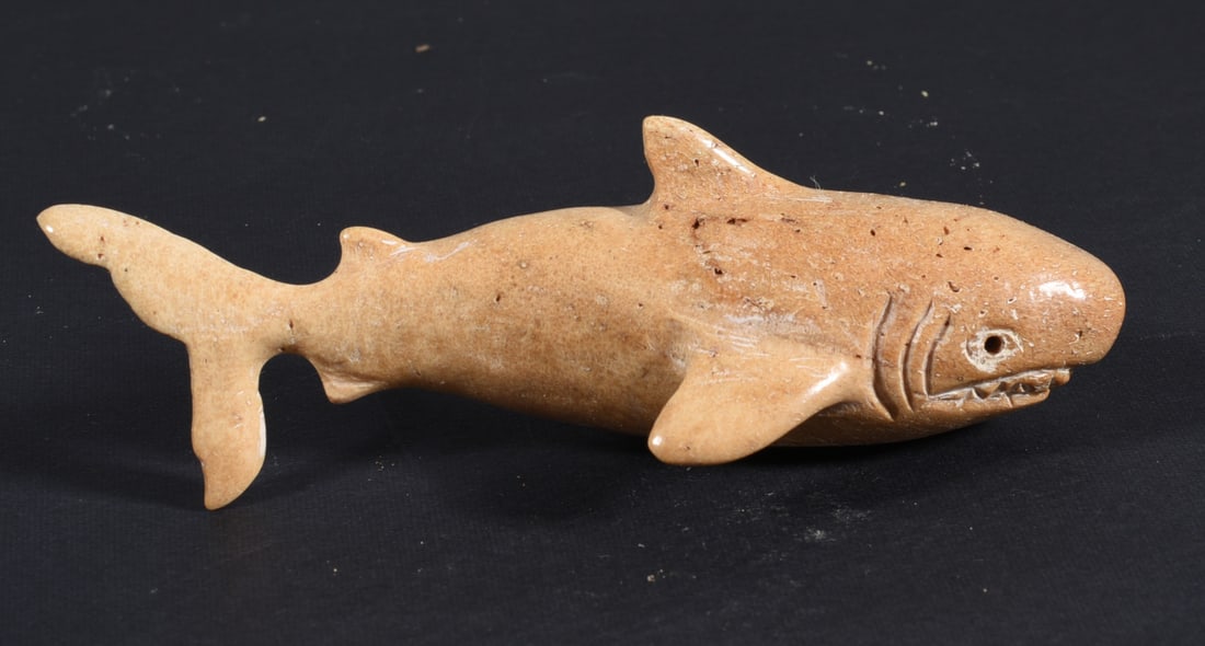 Inuit Carved Whale Bone Shark: These bone carvings were found in an attic trunk wrapped in 1960s newspaper. The collection came straight from the attic to our gallery and we unwrapped and photoed. All of these are small under 7". W