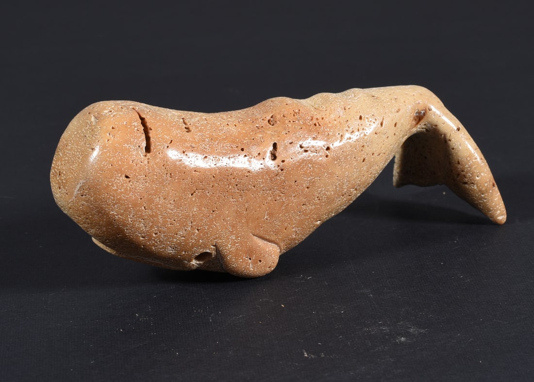 Inuit Carved Whale Bone Whale: These bone carvings were found in an attic trunk wrapped in 1960s newspaper. The collection came straight from the attic to our gallery and we unwrapped and photoed. All of these are small under 7". W