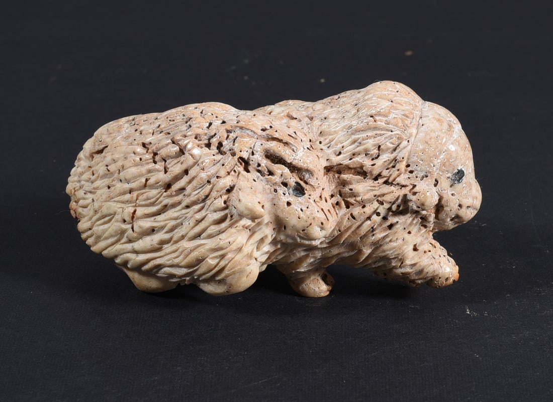 Inuit Carved Whale Bone Figure: These bone carvings were found in an attic trunk wrapped in 1960s newspaper. The collection came straight from the attic to our gallery and we unwrapped and photoed. All of these are small under 7". W