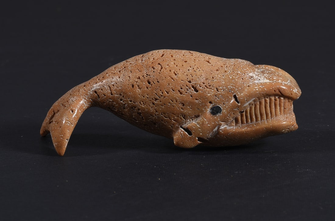 Inuit Carved Whale Bone Figure: These bone carvings were found in an attic trunk wrapped in 1960s newspaper. The collection came straight from the attic to our gallery and we unwrapped and photoed. All of these are small under 7". W