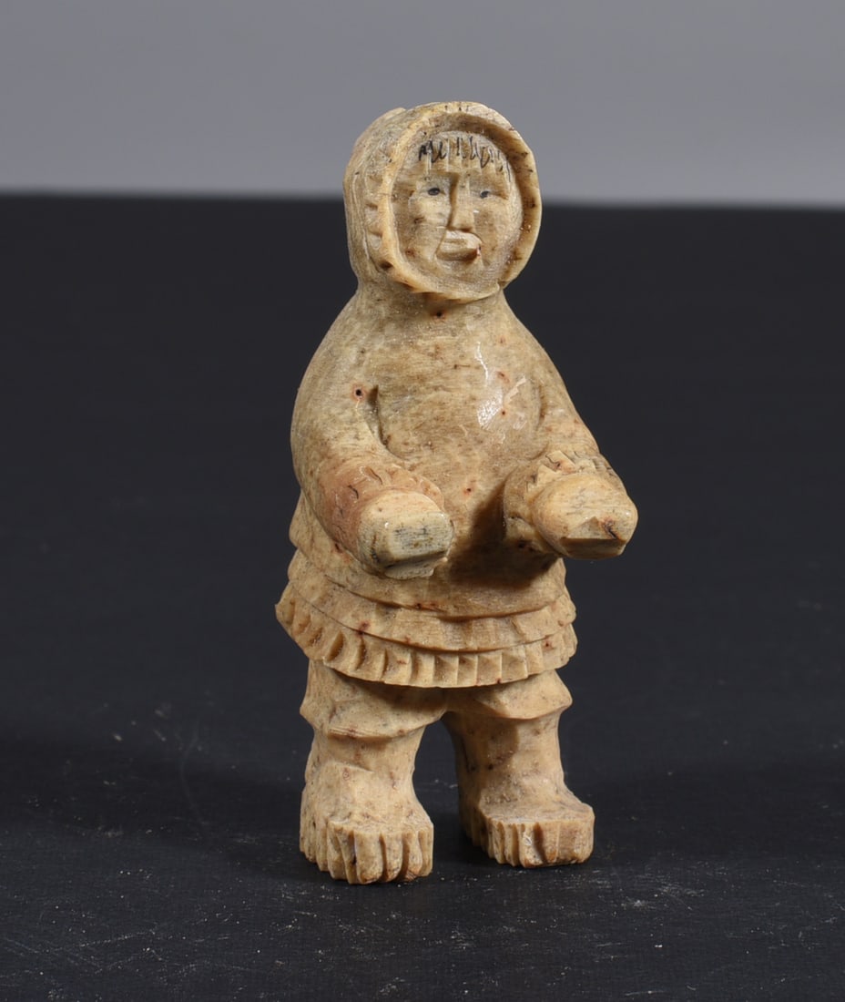 Inuit Carved Whale Bone Figure: These bone carvings were found in an attic trunk wrapped in 1960s newspaper. The collection came straight from the attic to our gallery and we unwrapped and photoed. All of these are small under 7". W
