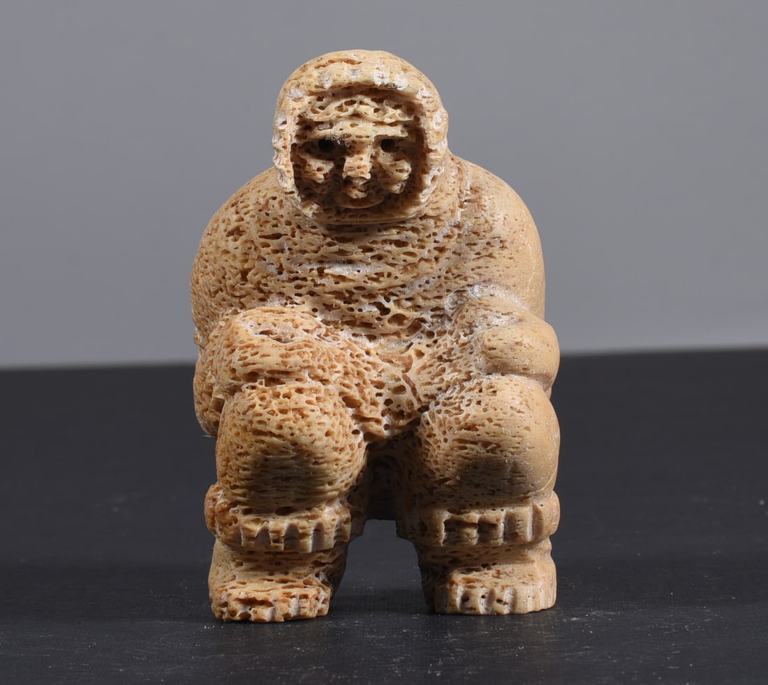 Inuit Carved Whale Bone Figure: These bone carvings were found in an attic trunk wrapped in 1960s newspaper. The collection came straight from the attic to our gallery and we unwrapped and photoed. All of these are small under 7". W
