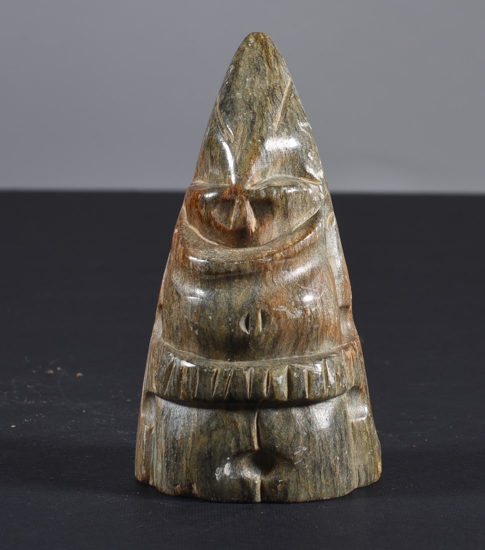 Inuit Carved Whale Bone Figure: These bone carvings were found in an attic trunk wrapped in 1960s newspaper. The collection came straight from the attic to our gallery and we unwrapped and photoed. All of these are small under 7". W