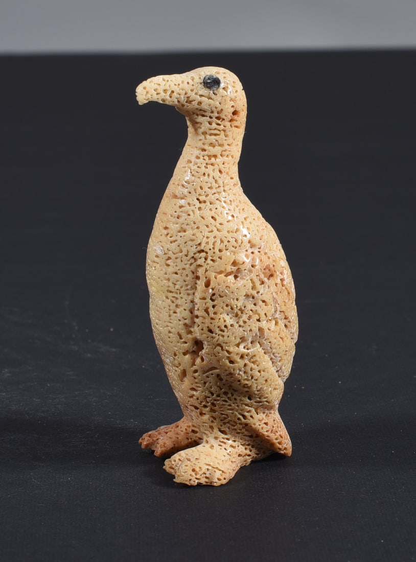 Inuit Carved Whale Bone Figure: These bone carvings were found in an attic trunk wrapped in 1960s newspaper. The collection came straight from the attic to our gallery and we unwrapped and photoed. All of these are small under 7". W