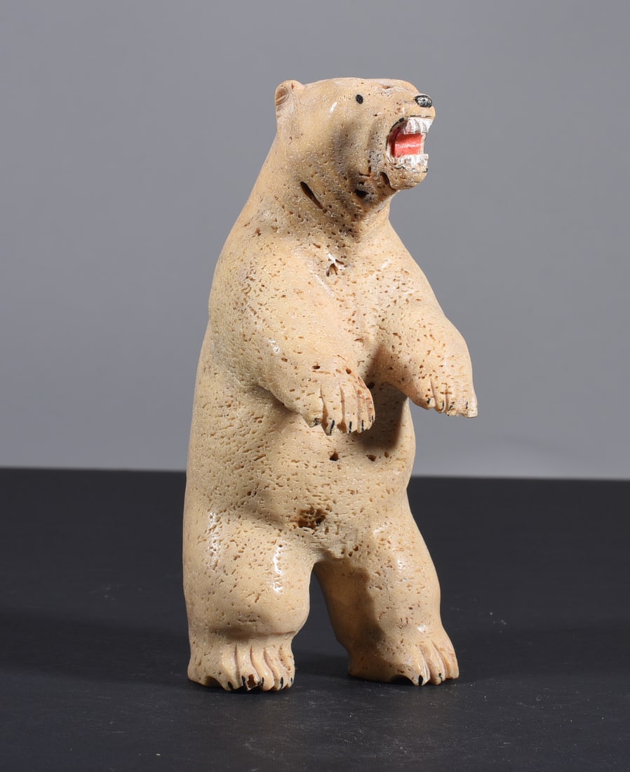 Inuit Carved Whale Bone Figure: These bone carvings were found in an attic trunk wrapped in 1960s newspaper. The collection came straight from the attic to our gallery and we unwrapped and photoed. All of these are small under 7". W