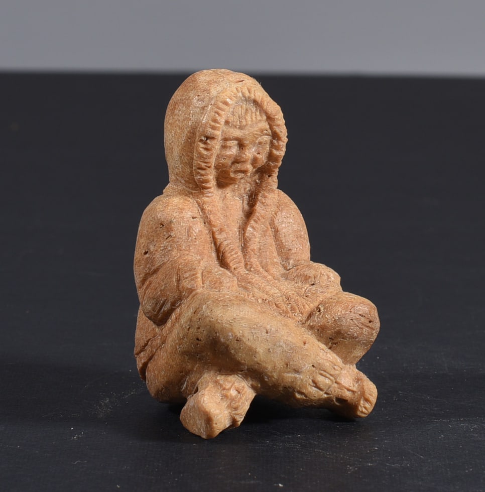 Inuit Carved Whale Bone Figure: These bone carvings were found in an attic trunk wrapped in 1960s newspaper. The collection came straight from the attic to our gallery and we unwrapped and photoed. All of these are small under 7". W