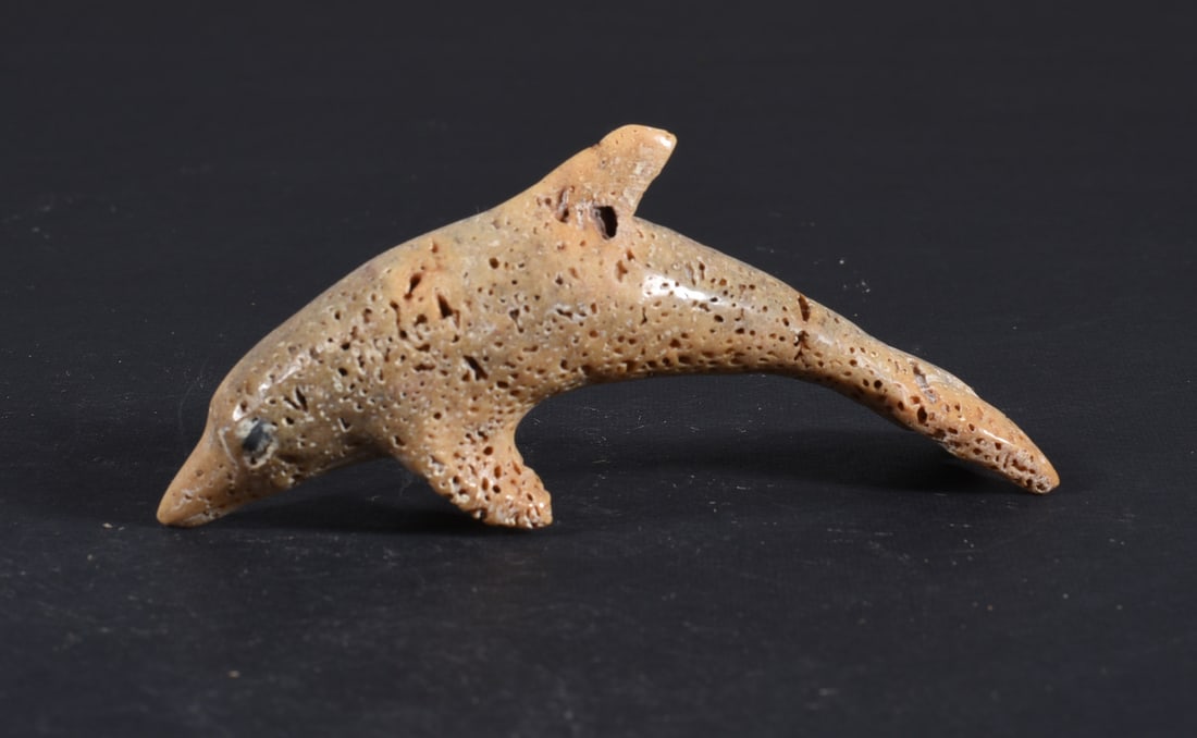 Inuit Carved Whale Bone Figure: These bone carvings were found in an attic trunk wrapped in 1960s newspaper. The collection came straight from the attic to our gallery and we unwrapped and photoed. All of these are small under 7". W