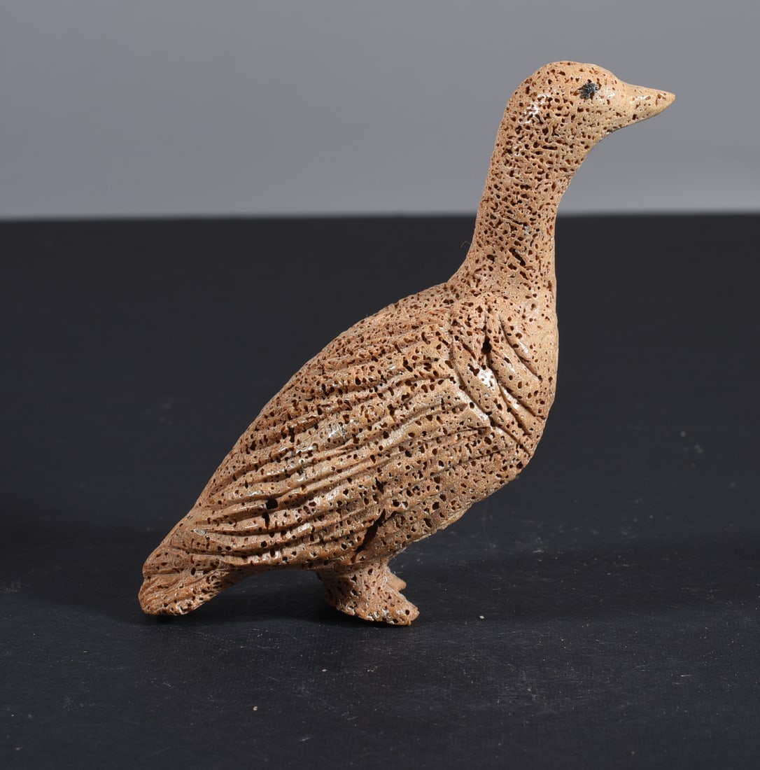 Inuit Carved Whale Bone Figure: These bone carvings were found in an attic trunk wrapped in 1960s newspaper. The collection came straight from the attic to our gallery and we unwrapped and photoed. All of these are small under 7". W