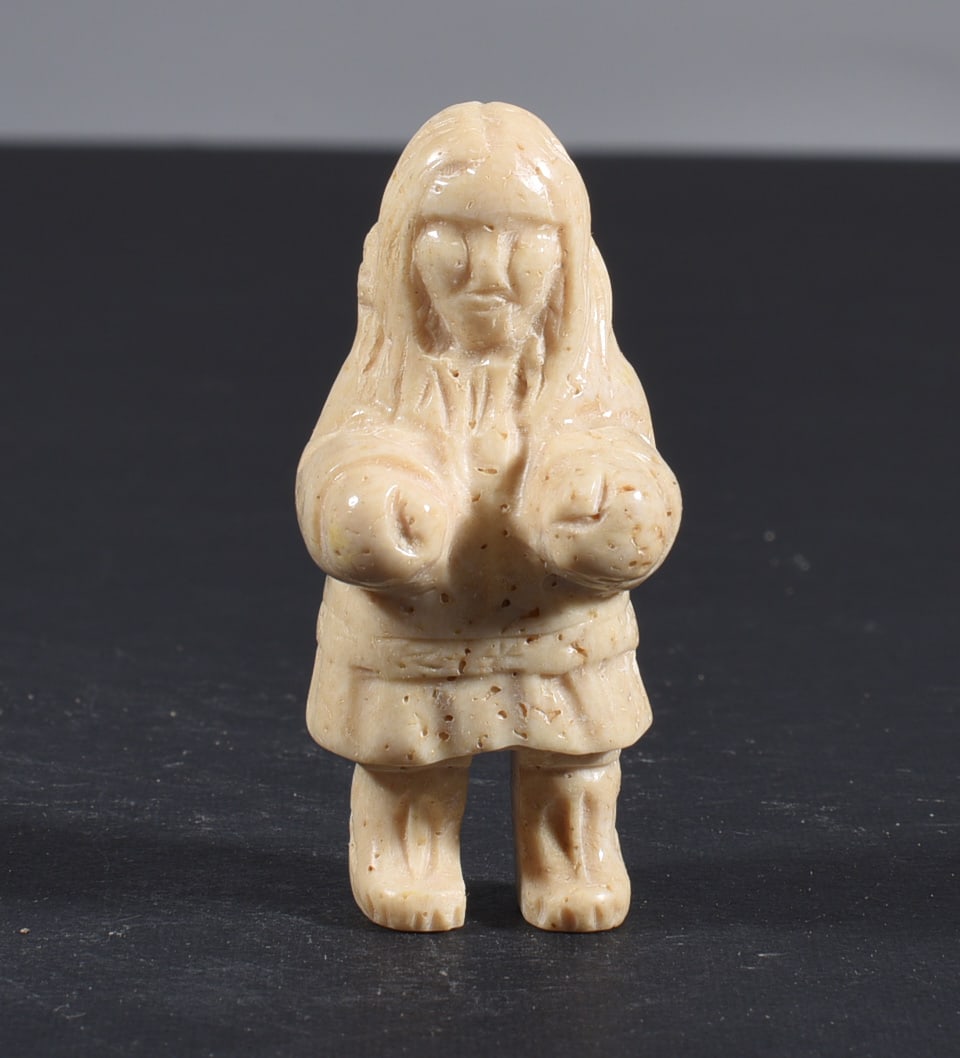 Inuit Carved Whale Bone Figure: These bone carvings were found in an attic trunk wrapped in 1960s newspaper. The collection came straight from the attic to our gallery and we unwrapped and photoed. All of these are small under 7". W