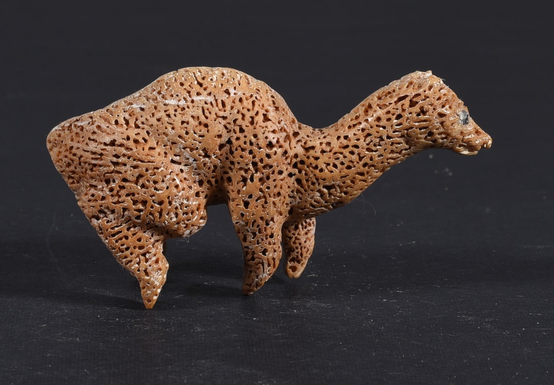 Inuit Carved Whale Bone Figure: These bone carvings were found in an attic trunk wrapped in 1960s newspaper. The collection came straight from the attic to our gallery and we unwrapped and photoed. All of these are small under 7". W