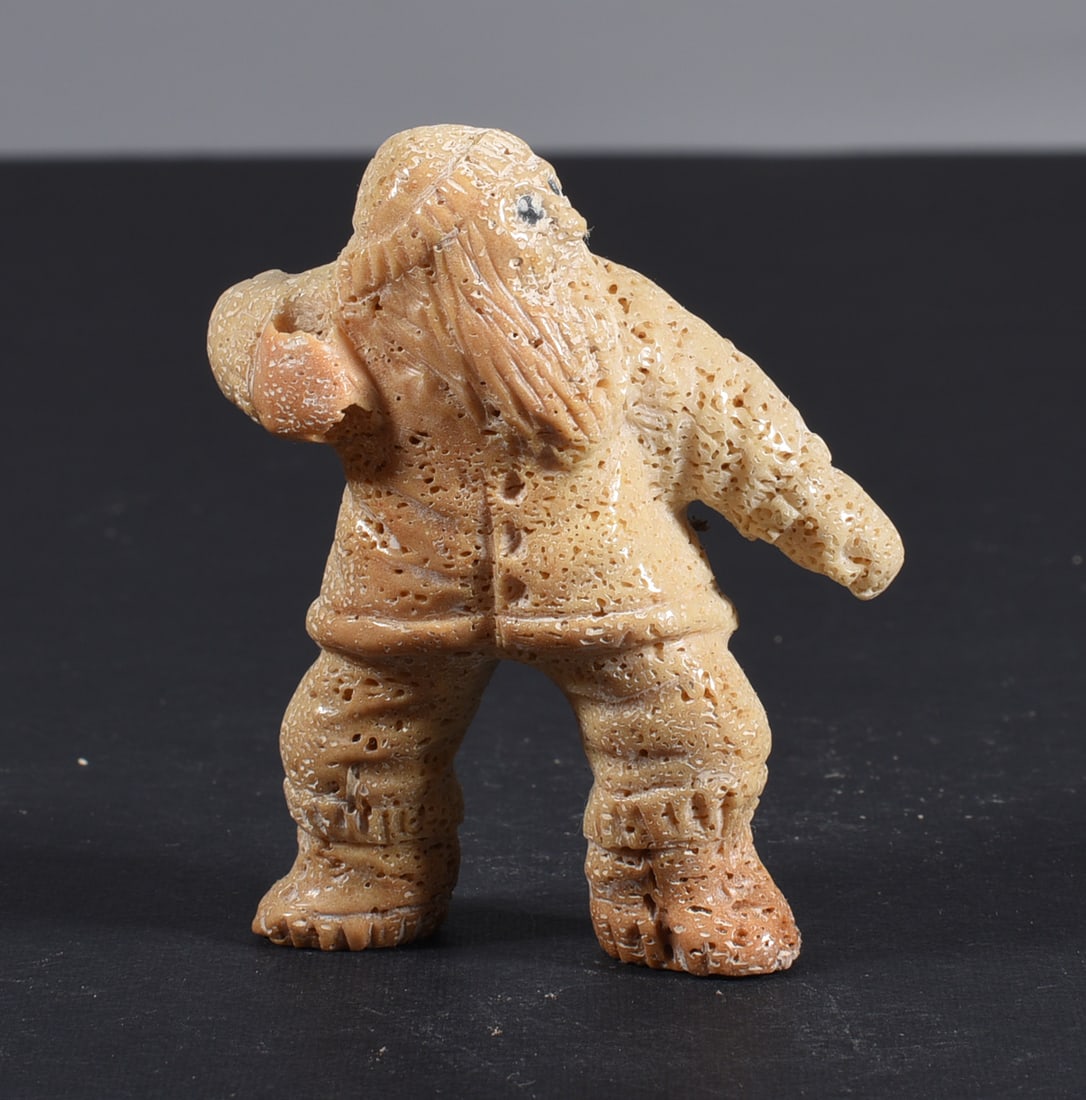 Inuit Carved Whale Bone Figure: These bone carvings were found in an attic trunk wrapped in 1960s newspaper. The collection came straight from the attic to our gallery and we unwrapped and photoed. All of these are small under 7". W