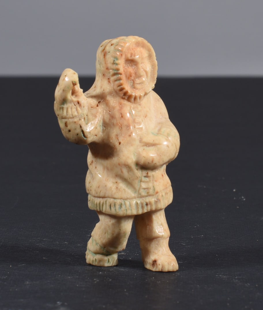 Inuit Carved Whale Bone Figure: These bone carvings were found in an attic trunk wrapped in 1960s newspaper. The collection came straight from the attic to our gallery and we unwrapped and photoed. All of these are small under 7". W