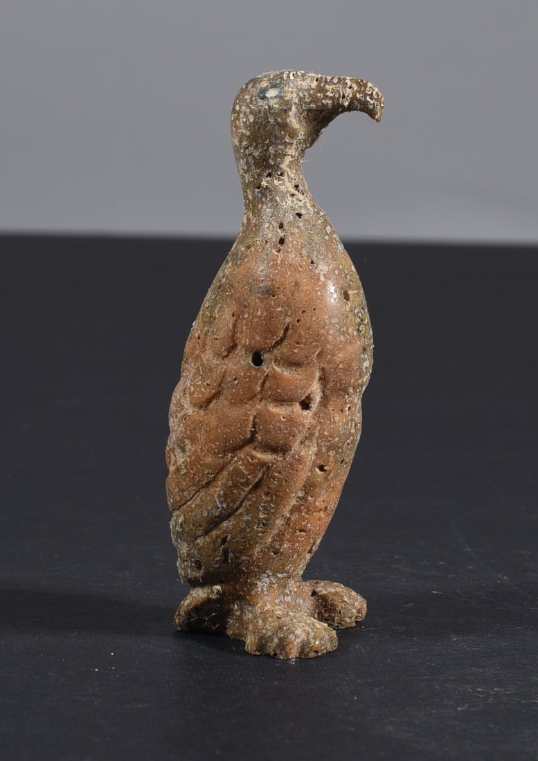 Inuit Carved Whale Bone Figure: These bone carvings were found in an attic trunk wrapped in 1960s newspaper. The collection came straight from the attic to our gallery and we unwrapped and photoed. All of these are small under 7". W