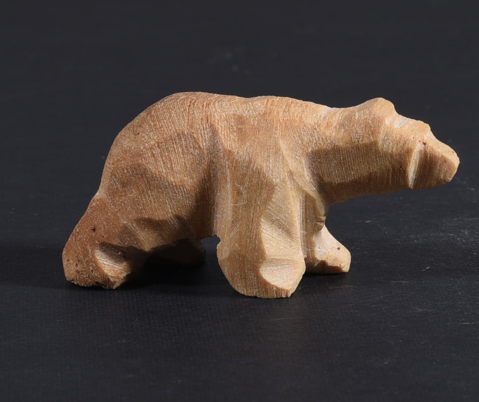 Inuit Carved Whale Bone Figure: These bone carvings were found in an attic trunk wrapped in 1960s newspaper. The collection came straight from the attic to our gallery and we unwrapped and photoed. All of these are small under 7". W