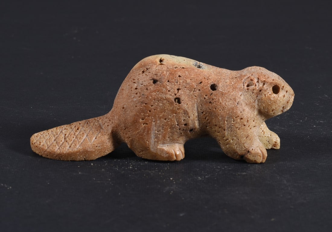 Inuit Carved Whale Bone Figure: These bone carvings were found in an attic trunk wrapped in 1960s newspaper. The collection came straight from the attic to our gallery and we unwrapped and photoed. All of these are small under 7". W