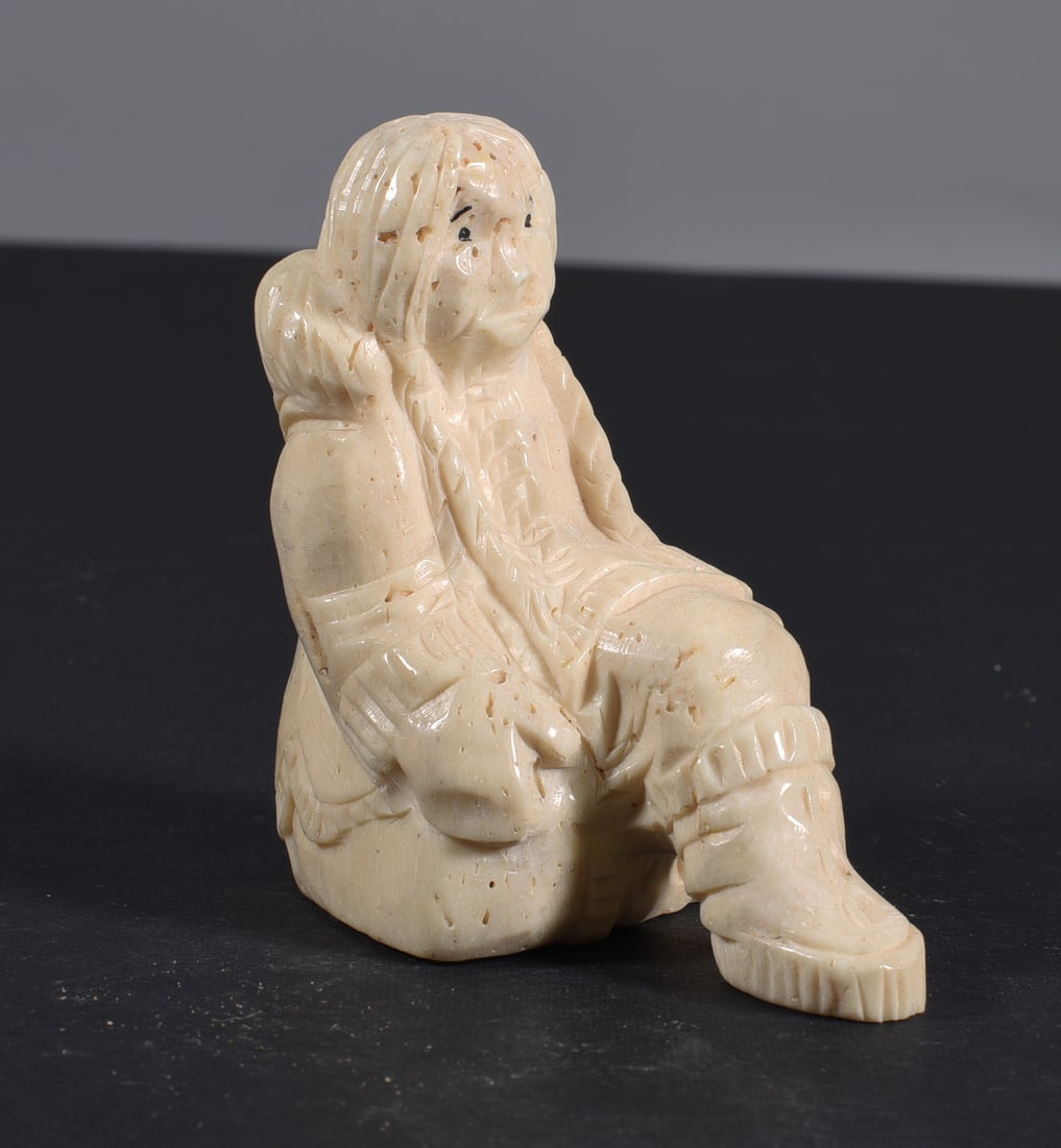 Inuit Carved Whale Bone Figure: These bone carvings were found in an attic trunk wrapped in 1960s newspaper. The collection came straight from the attic to our gallery and we unwrapped and photoed. All of these are small under 7". W