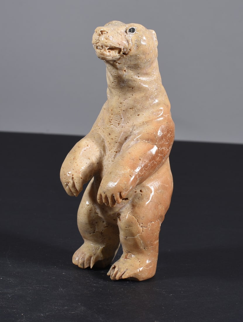 Inuit Carved Whale Bone Figure: These bone carvings were found in an attic trunk wrapped in 1960s newspaper. The collection came straight from the attic to our gallery and we unwrapped and photoed. All of these are small under 7". W