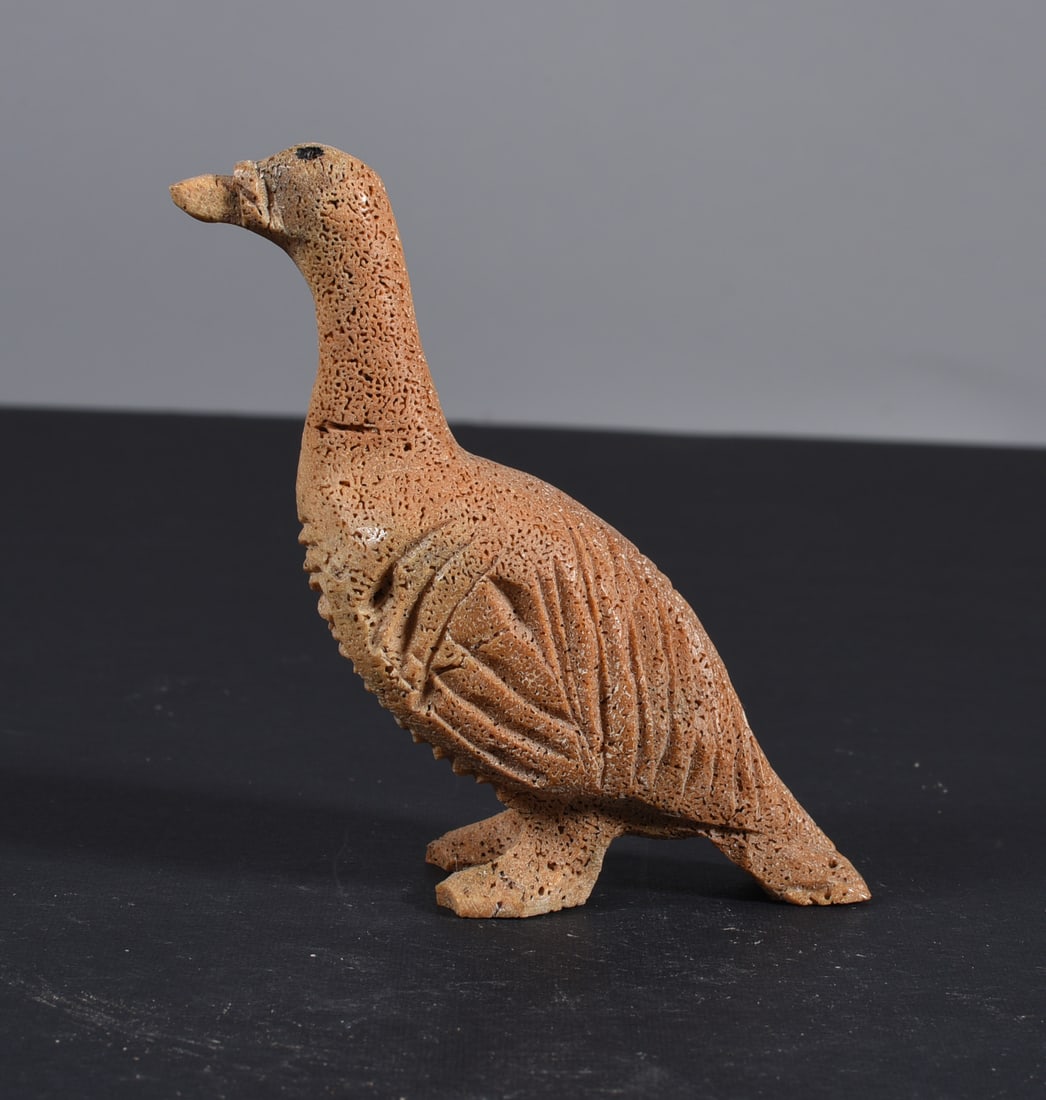 Inuit Carved Whale Bone Figure: These bone carvings were found in an attic trunk wrapped in 1960s newspaper. The collection came straight from the attic to our gallery and we unwrapped and photoed. All of these are small under 7". W