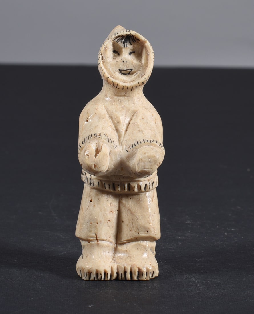 Inuit Carved Whale Bone Figure: These bone carvings were found in an attic trunk wrapped in 1960s newspaper. The collection came straight from the attic to our gallery and we unwrapped and photoed. All of these are small under 7". W