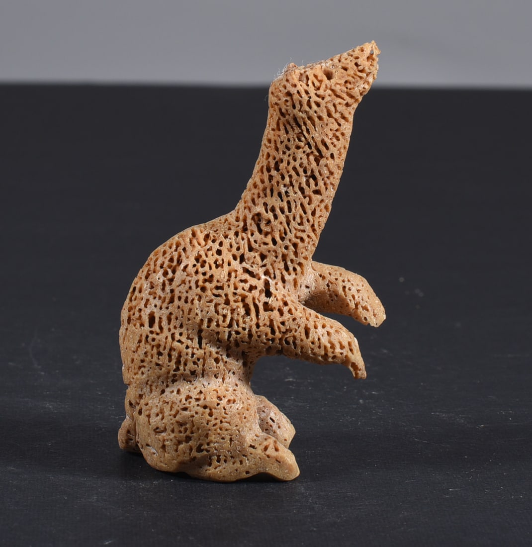 Inuit Carved Whale Bone Figure: These bone carvings were found in an attic trunk wrapped in 1960s newspaper. The collection came straight from the attic to our gallery and we unwrapped and photoed. All of these are small under 7". W
