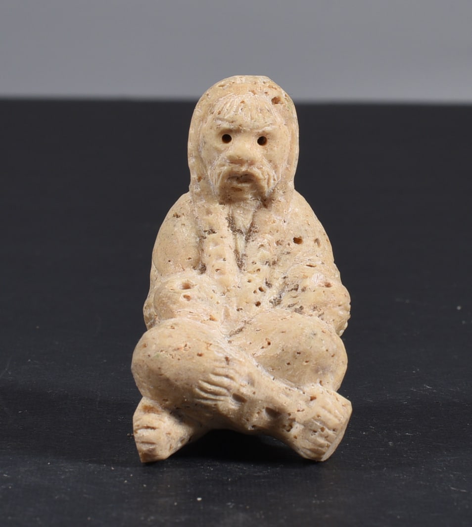 Inuit Carved Whale Bone Figure: These bone carvings were found in an attic trunk wrapped in 1960s newspaper. The collection came straight from the attic to our gallery and we unwrapped and photoed. All of these are small under 7". W