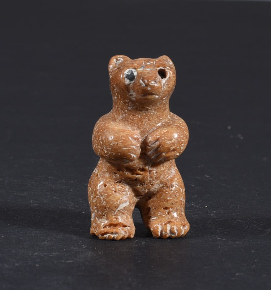 Inuit Carved Whale Bone Figure: These bone carvings were found in an attic trunk wrapped in 1960s newspaper. The collection came straight from the attic to our gallery and we unwrapped and photoed. All of these are small under 7". W