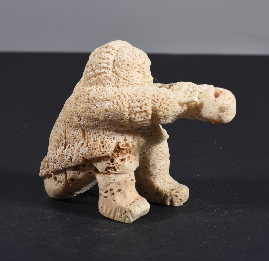 Inuit Carved Whale Bone Figure: These bone carvings were found in an attic trunk wrapped in 1960s newspaper. The collection came straight from the attic to our gallery and we unwrapped and photoed. All of these are small under 7". W