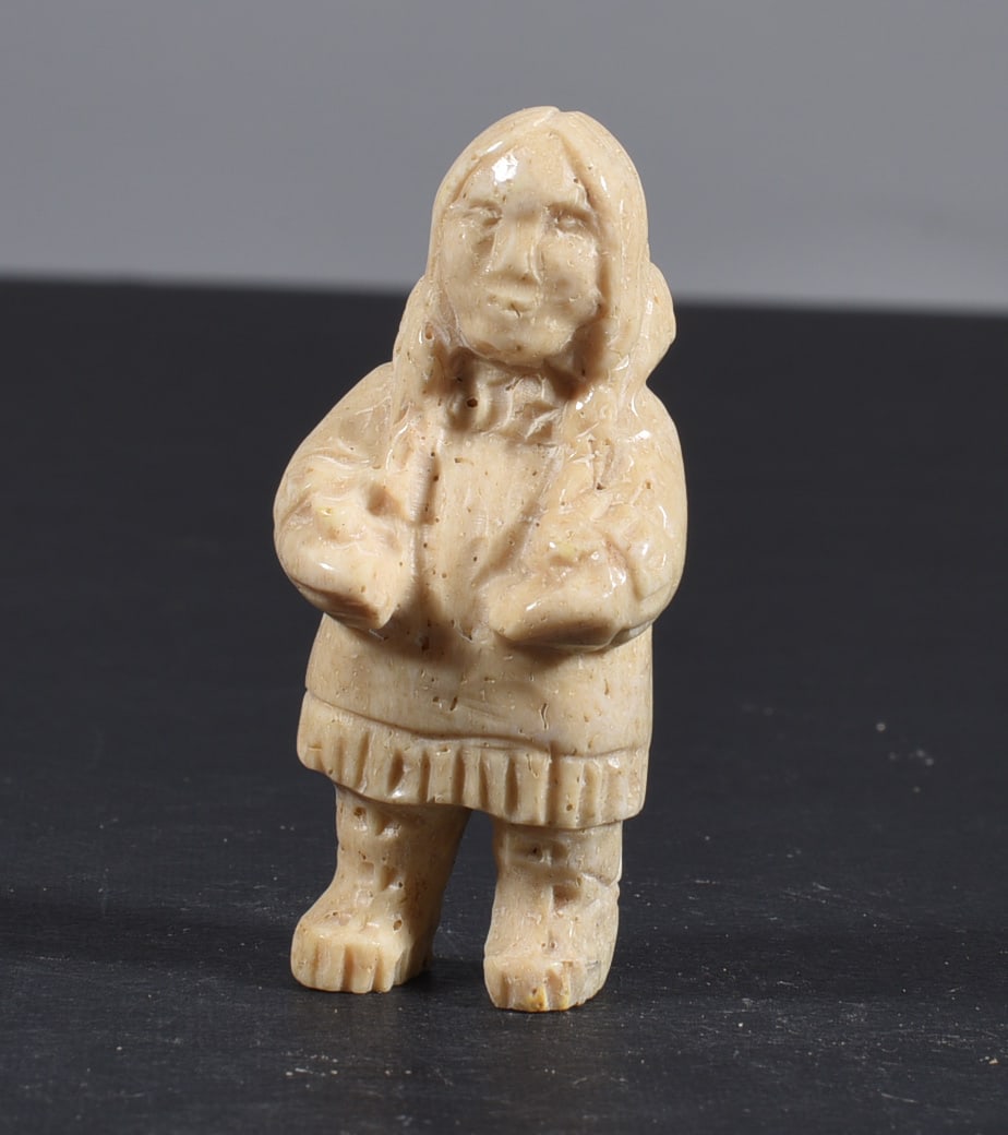 Inuit Carved Whale Bone Figure: These bone carvings were found in an attic trunk wrapped in 1960s newspaper. The collection came straight from the attic to our gallery and we unwrapped and photoed. All of these are small under 7". W