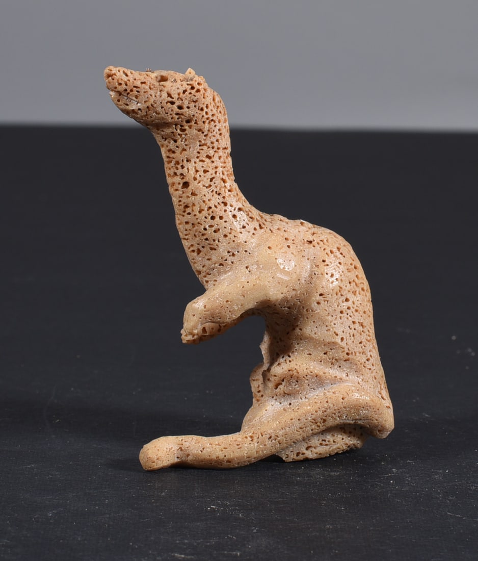Inuit Carved Whale Bone Figure: These bone carvings were found in an attic trunk wrapped in 1960s newspaper. The collection came straight from the attic to our gallery and we unwrapped and photoed. All of these are small under 7". W