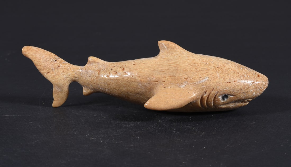 Inuit Carved Whale Bone Figure: These bone carvings were found in an attic trunk wrapped in 1960s newspaper. The collection came straight from the attic to our gallery and we unwrapped and photoed. All of these are small under 7". W