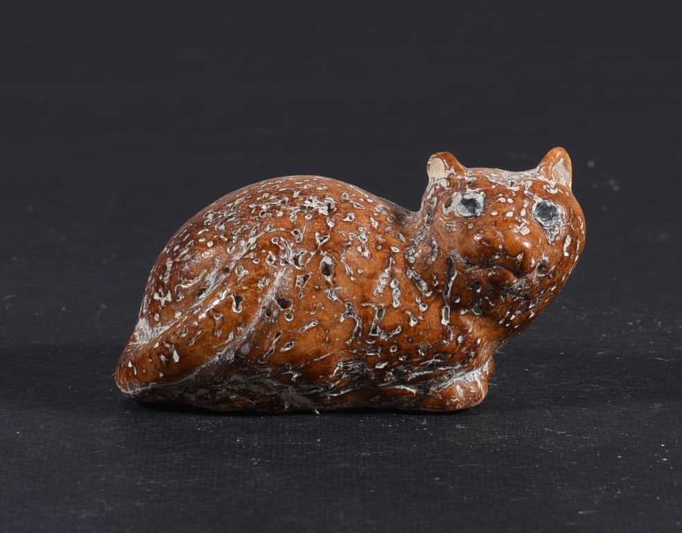 Inuit Carved Whale Bone Figure: These bone carvings were found in an attic trunk wrapped in 1960s newspaper. The collection came straight from the attic to our gallery and we unwrapped and photoed. All of these are small under 7". W