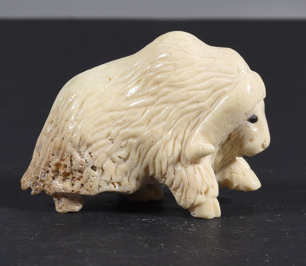 Inuit Carved Whale Bone Figure: These bone carvings were found in an attic trunk wrapped in 1960s newspaper. The collection came straight from the attic to our gallery and we unwrapped and photoed. All of these are small under 7". W