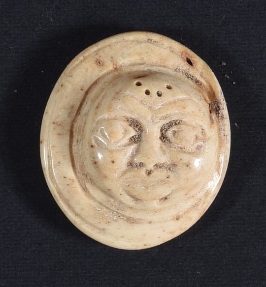 Inuit Carved Whale Bone Figure: These bone carvings were found in an attic trunk wrapped in 1960s newspaper. The collection came straight from the attic to our gallery and we unwrapped and photoed. All of these are small under 7". W