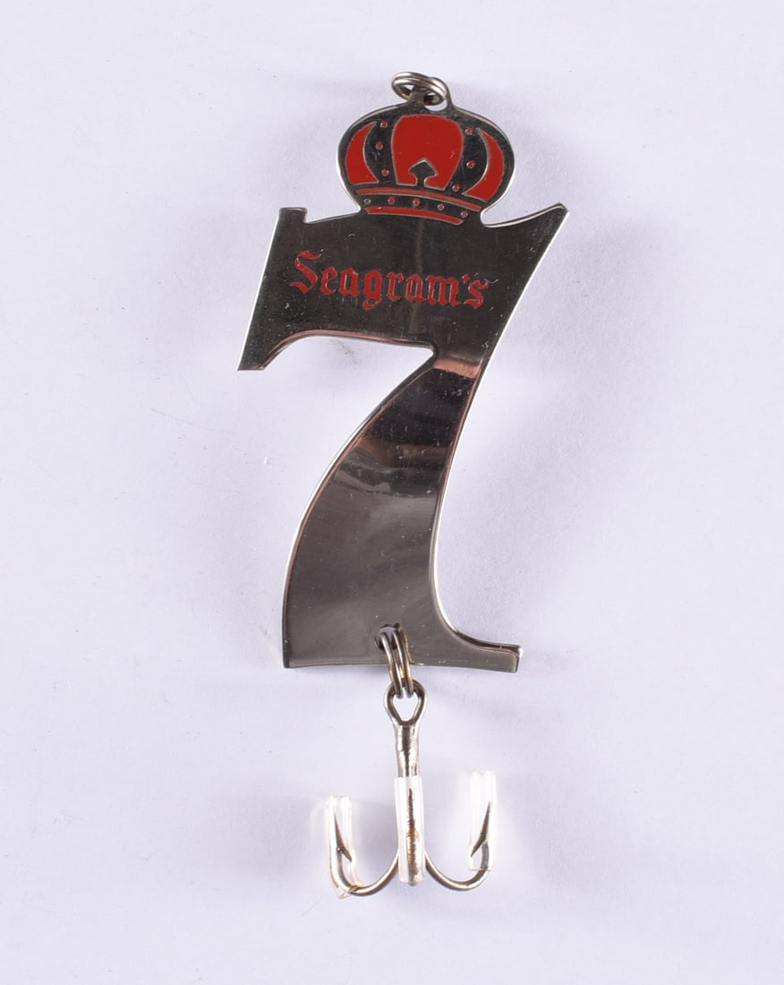 Vintage Seagrams Fishing Lure: all items are from an attic trunk. The second trunk taken out of an attic and displayed for auction. All items are small 1" to 3". We can ship items in a 6" box and fit as many as we can for aroun $10
