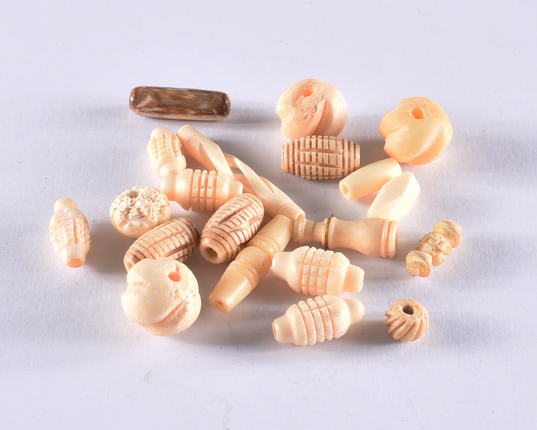 Bone Carved Beads: all items are from an attic trunk. The second trunk taken out of an attic and displayed for auction. All items are small 1" to 3". We can ship items in a 6" box and fit as many as we can for aroun $10