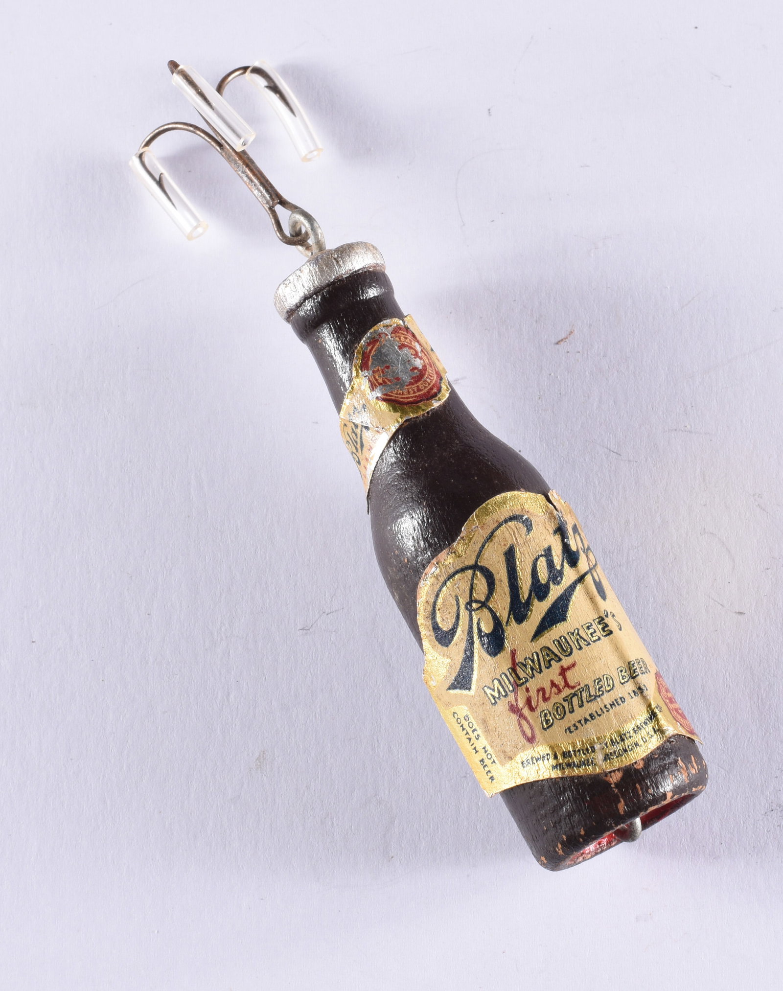 Milwaukee Bottle Fishing Lure: all items are from an attic trunk. The second trunk taken out of an attic and displayed for auction. All items are small 1" to 3". We can ship items in a 6" box and fit as many as we can for aroun $10
