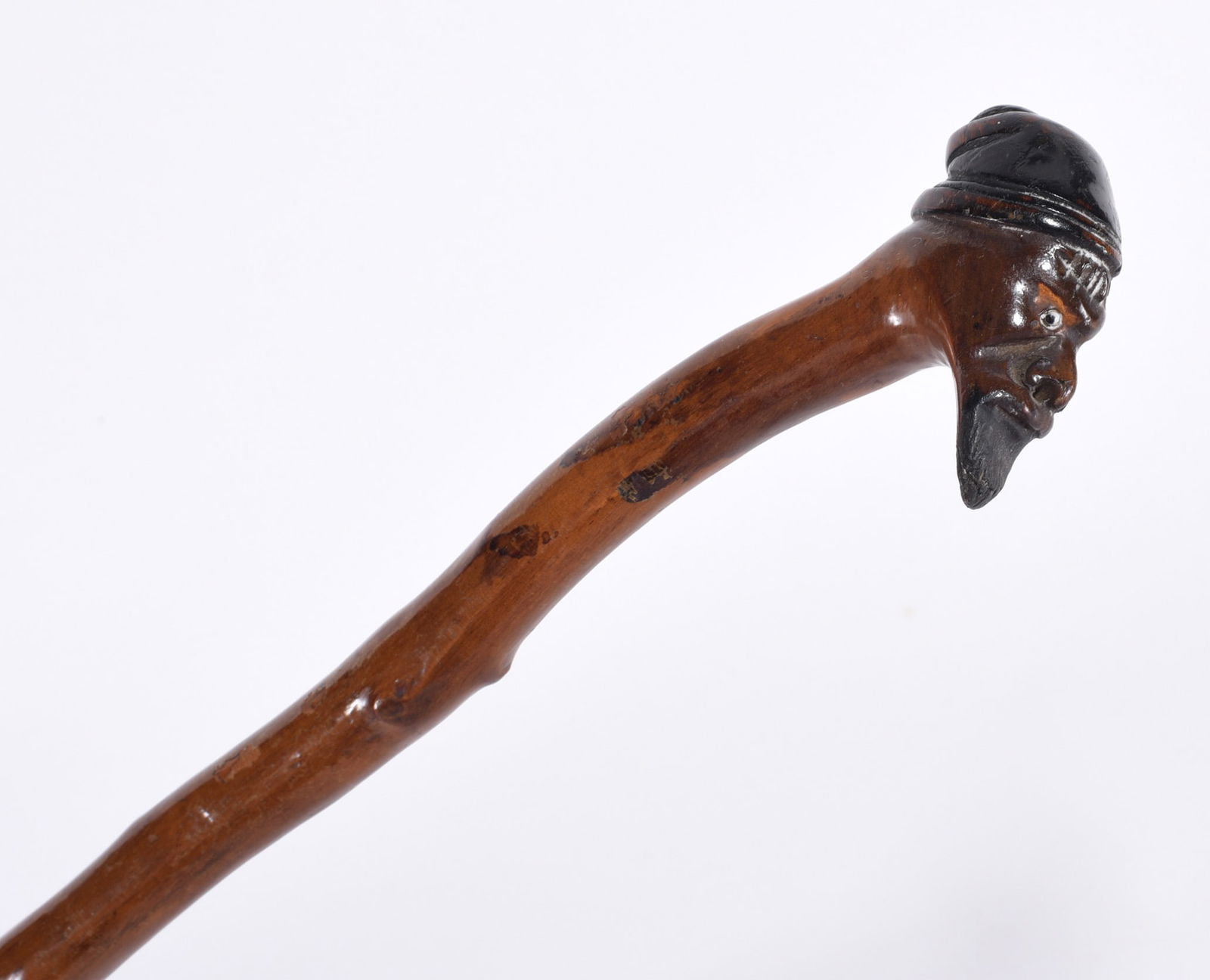 Folk Art Carved Cane Man with Beard Glass Eye: Carving of a mans head with hat and beard. One glass eye is present. Ca 1900