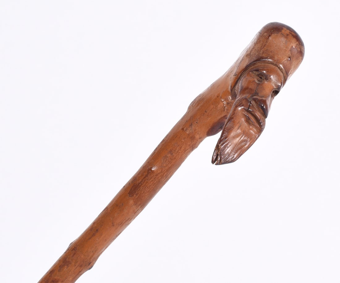 Folk Art Carved Cane man with beard: A very thin folk art cane carved face of man with orriginal Ferrell. Ca 1920