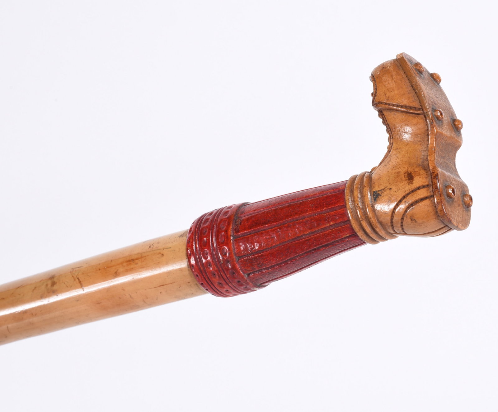 Folk Art Carved Cane Soccer Cleat French: Carved sports cleat with tall socks, red paint. Made in France.