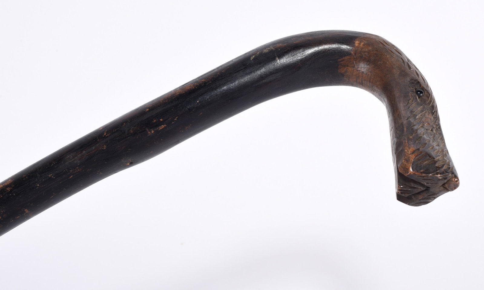 Folk Art Carved Cane Dog with Glass Eyes: Very naived carved dog with glass eyes. Ca. 1920