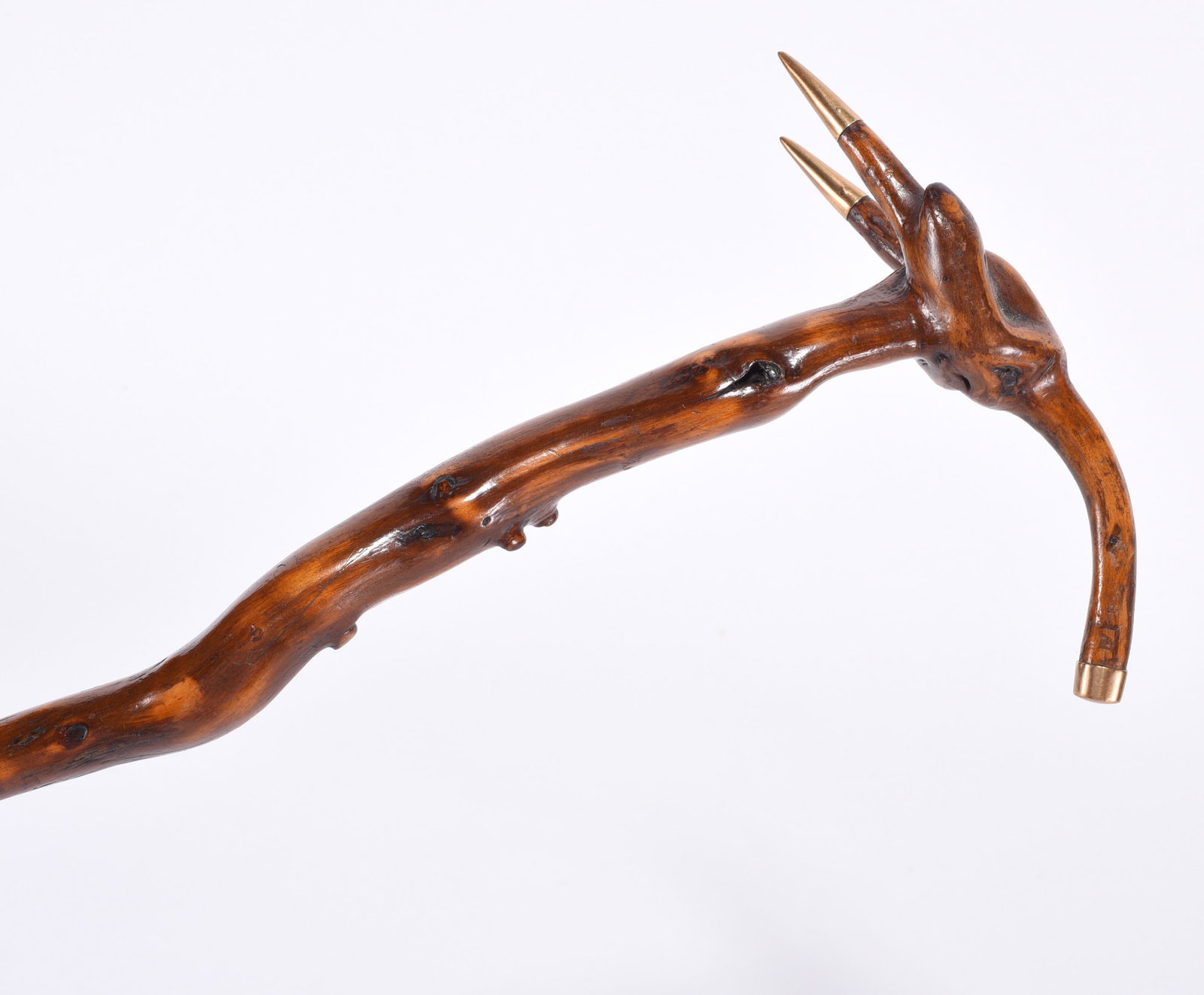 Folk Art Carved Cane: Carved cane with gold accents. Ca. 1950