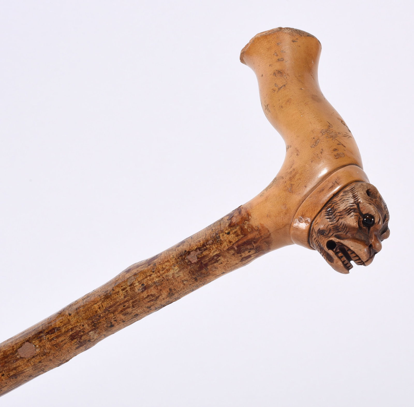 Folk Carved Walking Stick: carved head with glass eyes. Carved teeth. Ca. 1920