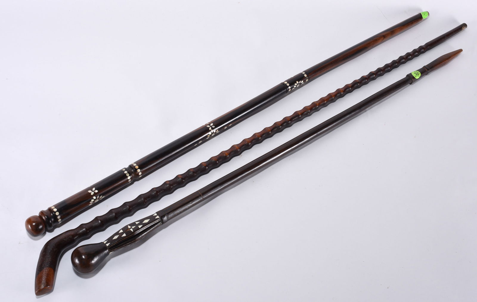 Collection of 3 Walking Sticks: inlayed with shells and pearl. 3 walking sticks