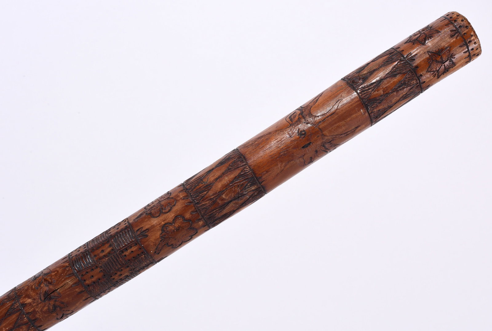 Carved Folk Art Cane: long folk art cane carved with animals and other figures.