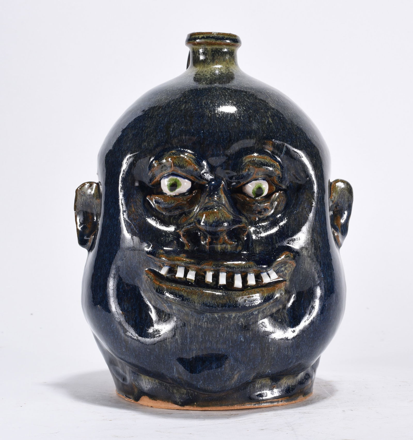 Marvin Bailey Face Jug: All the pottery in this auction is in excellent condition as fired. No chips or cracks. This auction is ran by the computer and will move fast. For best winning results leave your max bid and the comp