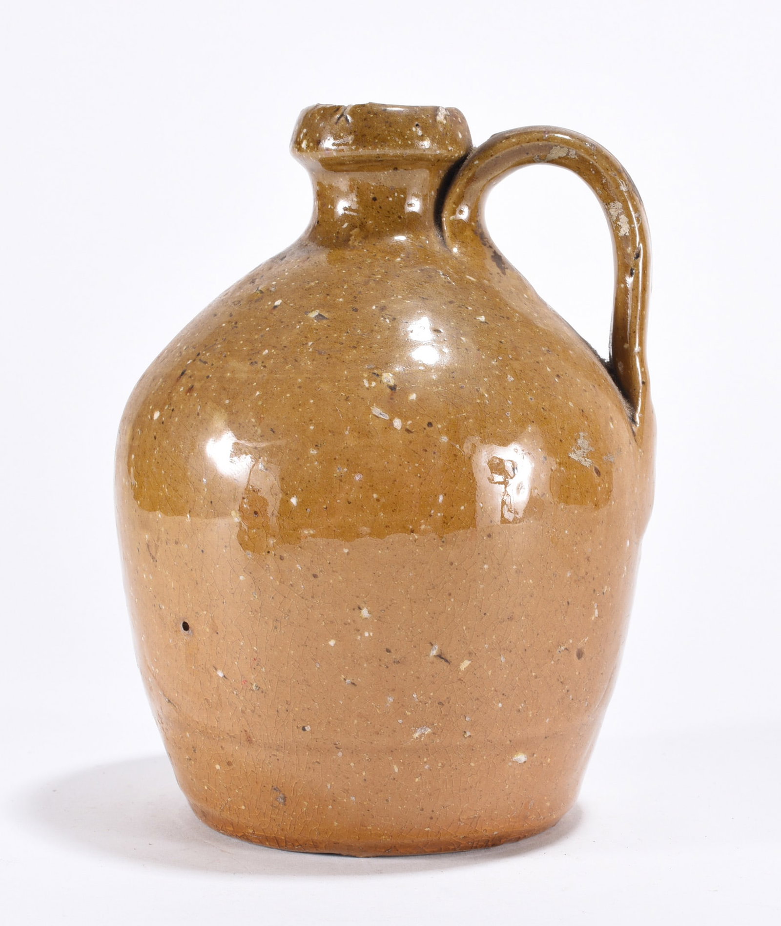North Carolina Jug ca. 1920: transitional jug not stamped or signed. 5.5" most likely craven or teague. All items can be in house shipped to get in house shipping select SELF ARRANGE. Shipping takes 3 weeks or less but up to 3 we