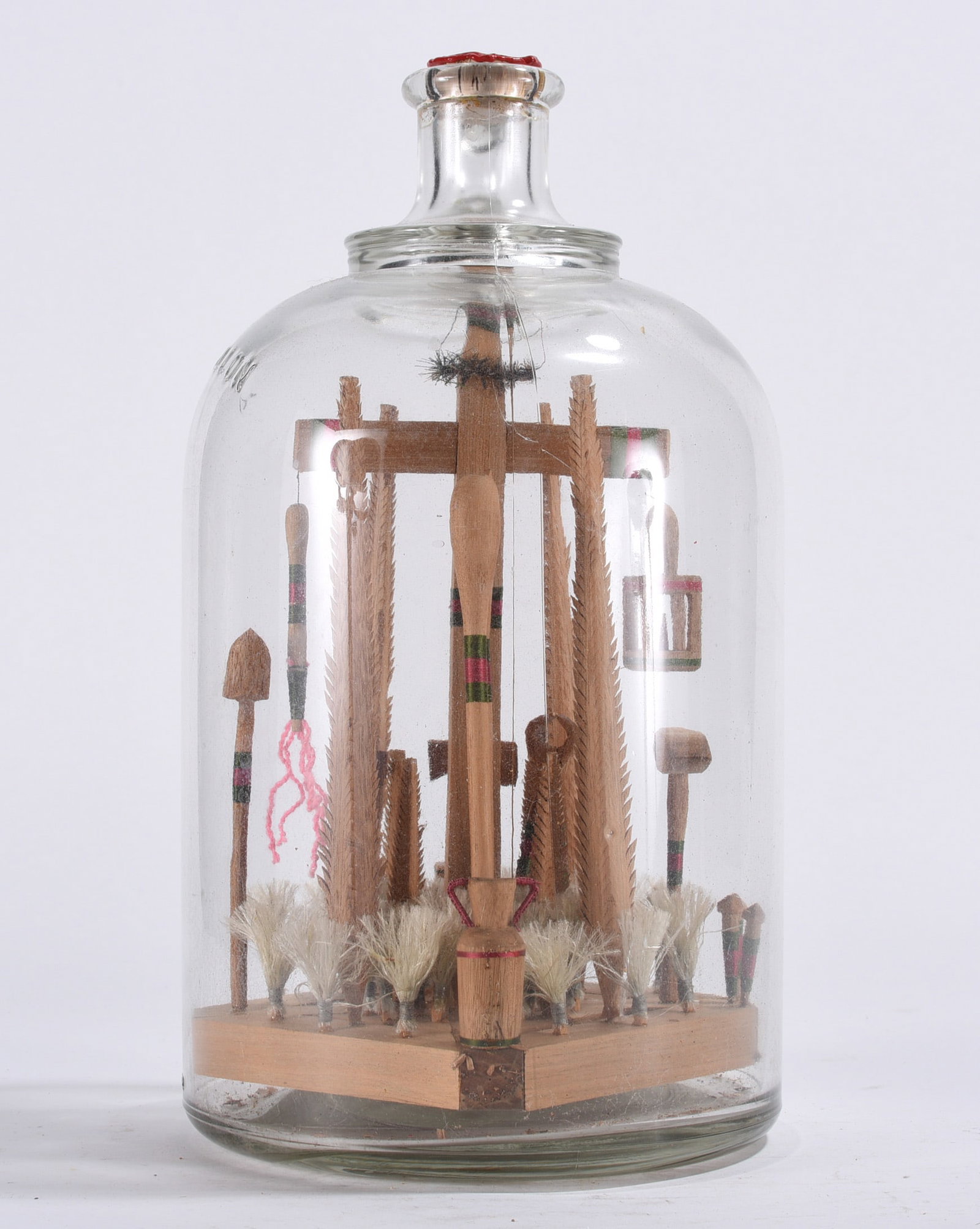 Folk Art Bottle Sculpture: bottle art, wood creation. 12"