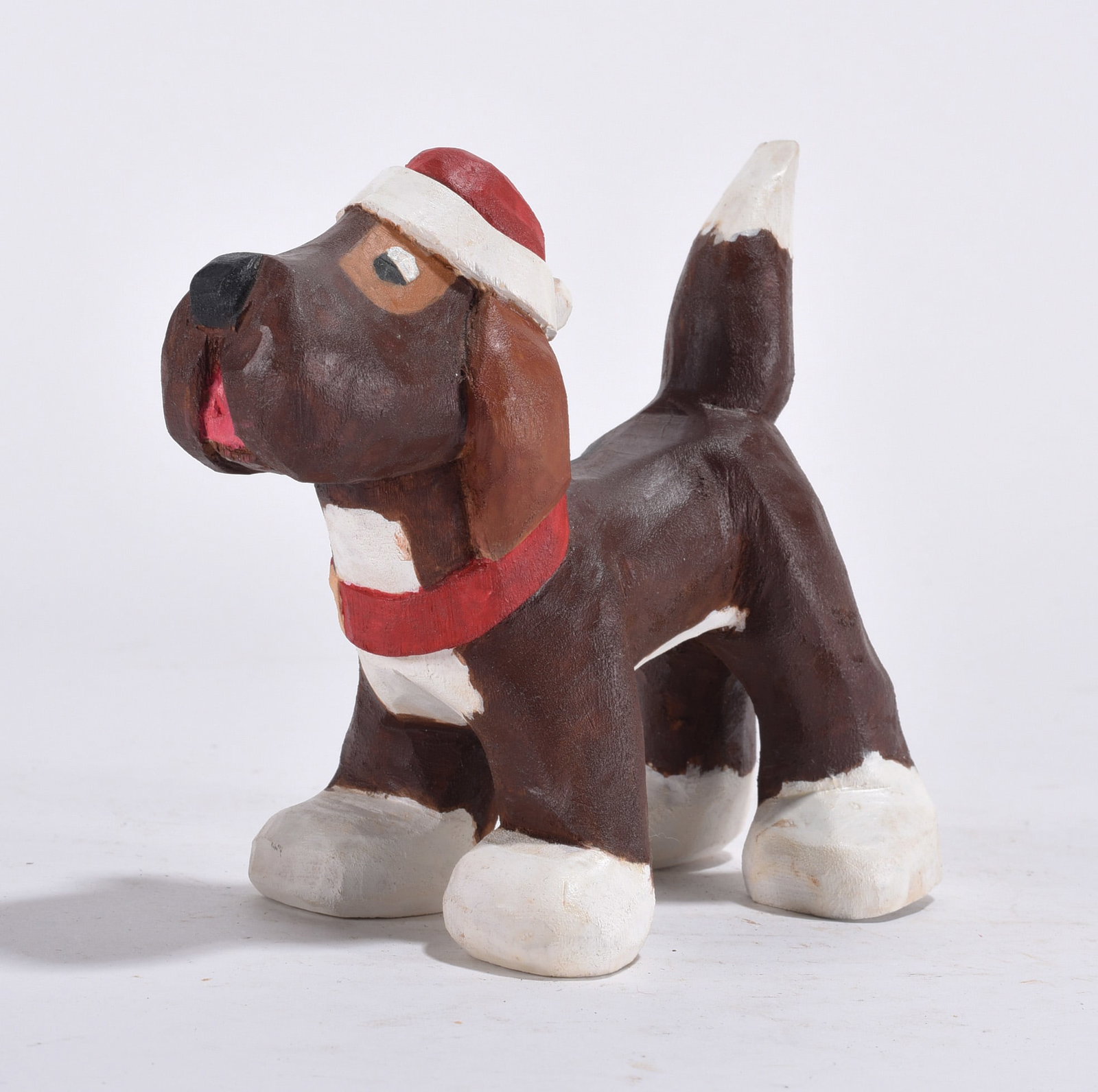 Bob Wise Folk Carved Dog: carved wooden dog, signed on bottom foot. 4.5"