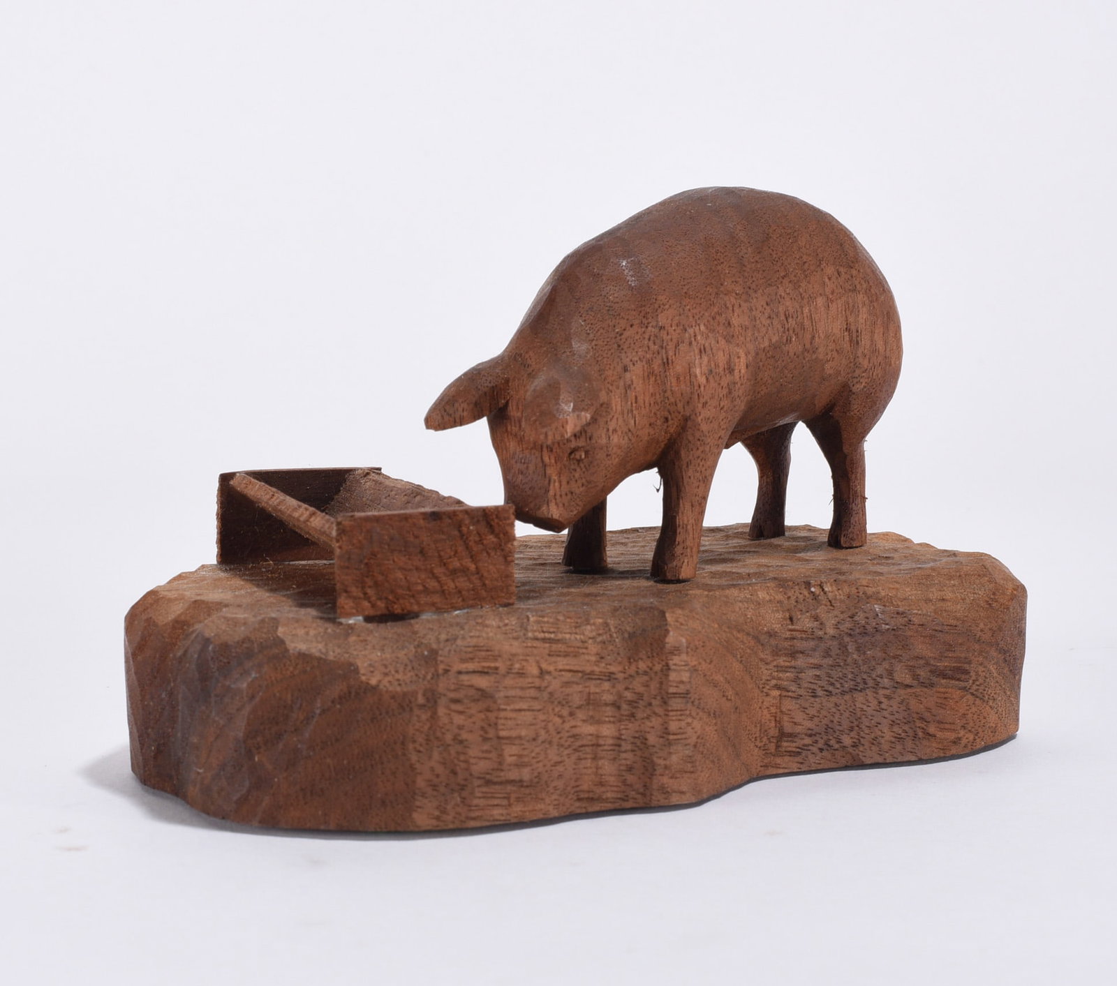 D. Dalton Carved Wooden Pig: nicely carved wooden pig. Ca. 1988. signed on bottom. 3.5"