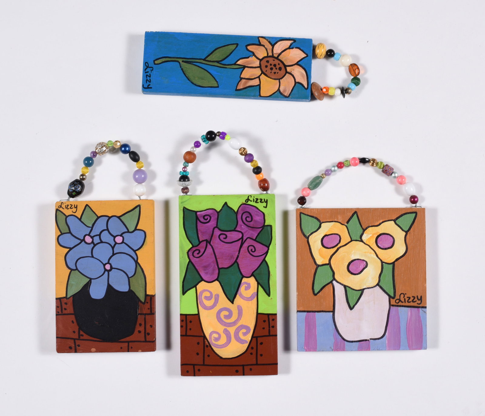 Folk Art Paintings by Lizzy Williams: Average size 4"x7" paint on wood, signed.